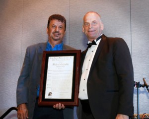 Michael Gazzalla with Ned Bowman accepting the FPMA Marketer of the Year Award
